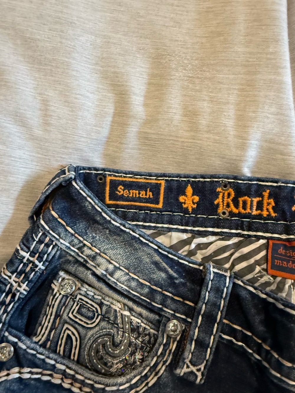 Rock Revival Navy Blue Distressed Jeans with White Stitching - Picture 3 of 5